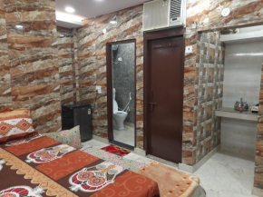 Luxurious studio apartment with attached kitchen, washroom, balcony, fridge, ac, Android led tv, wifi, in cream location of lajpat nagar 92,121,74700